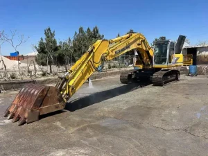 لوگوی بیل مکانیکی نیوهلند